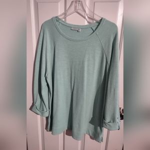 Light teal top with 3/4 cuffed sleeves